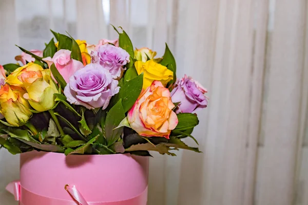 Colorful roses, beautiful flower bouquet.happy mothers day.Mix color roses in the box.pile of pink, yellow, orange, red, and white fresh roses isolated.round bouquet of multicolored roses