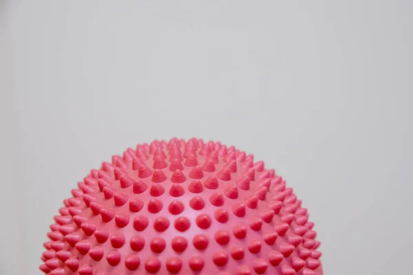 Spiky massage ball isolated on the white background.Flat feet correction exercise.half balance massage balls. rubber ball for self massage, reflexology and myofascial release.therapeutic exercise.Copy — Stock Image Spiky massage ball isolated on the white background.Flat feet correction exercise.half balance massage balls. rubber ball for self massage, reflexology and myofascial release.therapeutic exercise.Copy Royalty Free Stock Photos