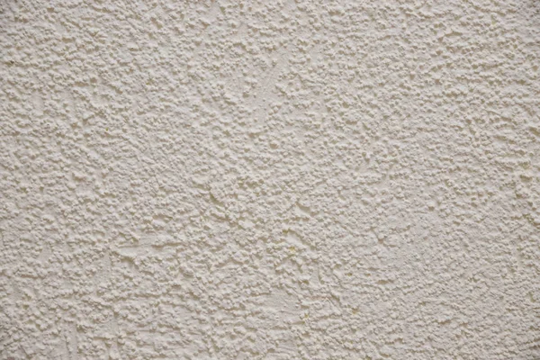 Textur der alten verputzten beige Farbe Zementwand, Oberflächenprägung scharfe und raue Muster der Beton-Tapete background.beige geprägter Hintergrund. Betonmauer — Stockfoto