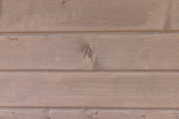 Textura da prancha de madeira para o seu fundo. Fundo de madeira do celeiro resistente ao intemperismo rústico com nós e furos.Textura de madeira escura. textura castanha. Mesa de madeira retro, parede — Fotografia de Stock