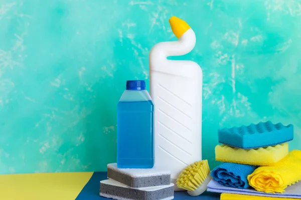 cleaning items household ,spray, brush, sponge. Disinfection and cleaning products in plastic bottles, sponges.restoring order, establishing order.cleanliness, hygiene,housekeeping concept