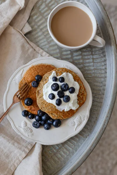 Healthy breakfast concept. Coffee with milk and oatmeal pancake — Stock Photo, Image