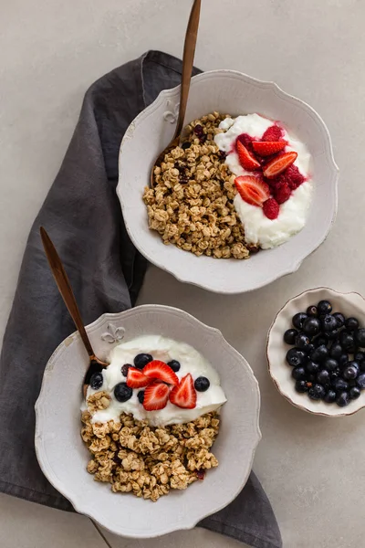 Healthy breakfast concept. Granola with yogurt and berrires.