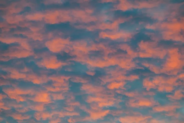 a sky image of clouds with a orange colour during sunset in Marbella, Spain