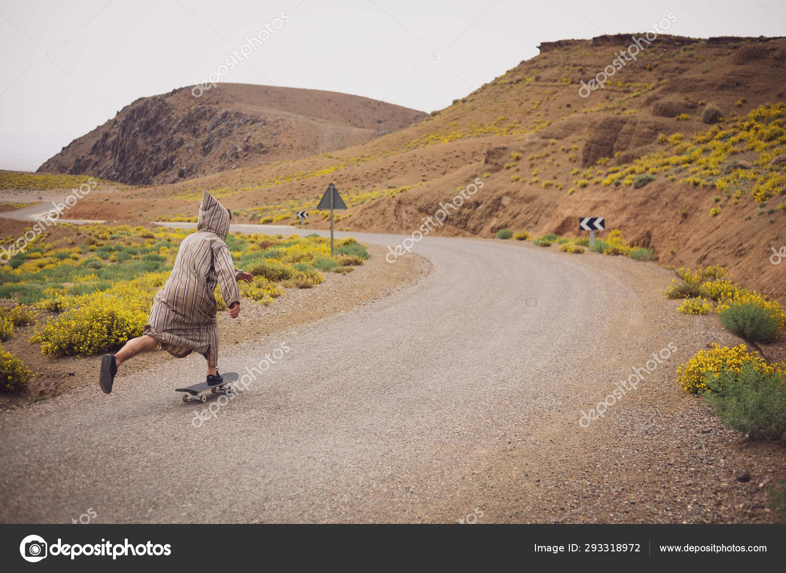 Side View Skateboarder Arabic Style Robe Riding Skate Road Hills Stock