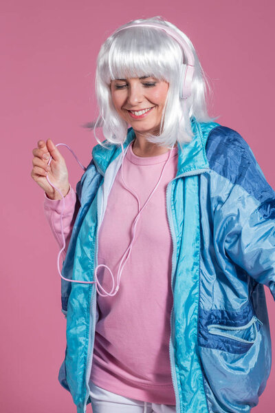 Young Woman Retro Clothes Listening Music Dancing Pink Background Studio Stock Picture