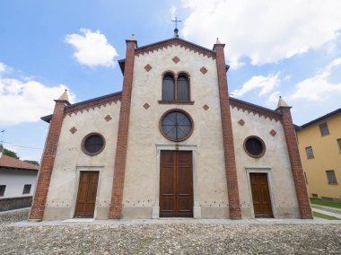 Exterior of the medieval San Vittore church at Agrate Conturbia, Novara, Piedmont, Italy, built in the 9th century clipart