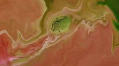 Yüzen mürekkep karışımı. Mermer dalga. Yaratıcı sanat soyutlaması üzerine odaksız pembe renkli su akrilik ıslak doku sıvı parçacıkları.