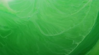 Mürekkep suyu dokusu. Boya damlası. Odaklanmamış yeşil renk sıçrama sıvısı parıltı ışıltı akrilik sanat akrilik yaratıcı arka plan.