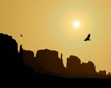 Batı Çölü. Kayalar. Uçan Kartallar. Sarı gökyüzü. Günbatımı . 