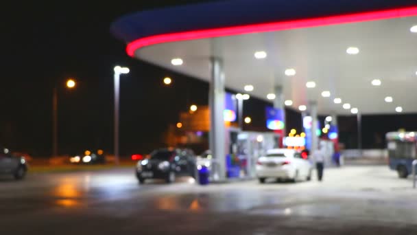 Iluminação Atmosférica Desfocada Posto Gasolina Noite — Vídeo de Stock