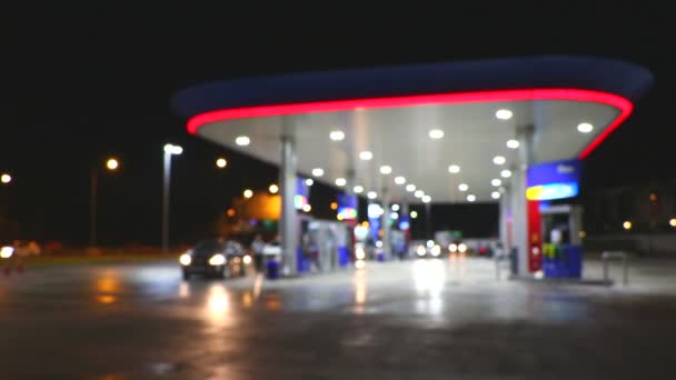 Iluminação Atmosférica Desfocada Posto Gasolina Noite — Vídeo de Stock