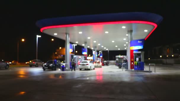 Iluminação Atmosférica Desfocada Posto Gasolina Noite — Vídeo de Stock