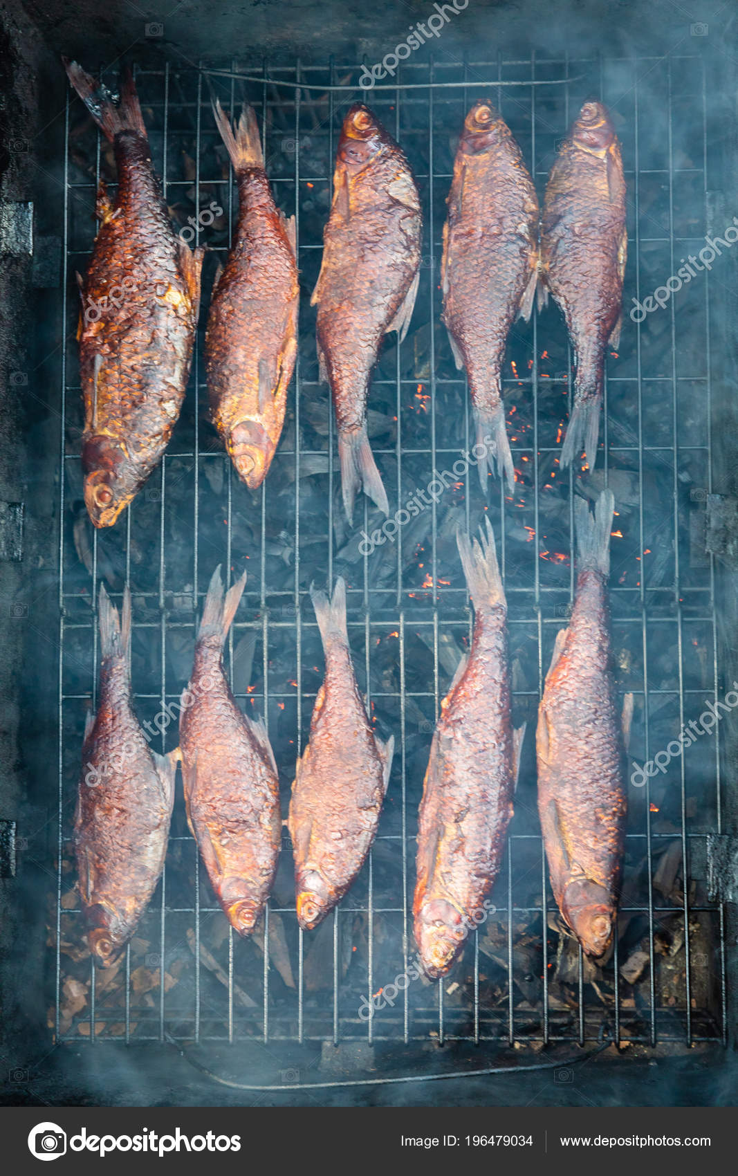 Smoked fish cooked in a small smoker — Stock Photo © alas_spb