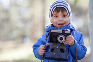 Çocuk, bebek çocuk ile fotoğraf makinesi