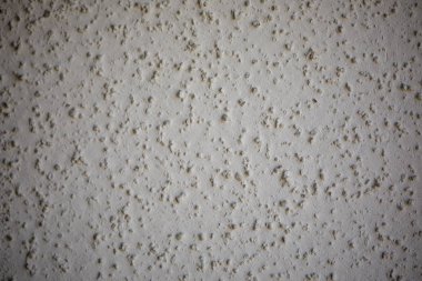 Gri benekli bir beton duvar, arka plan, doku