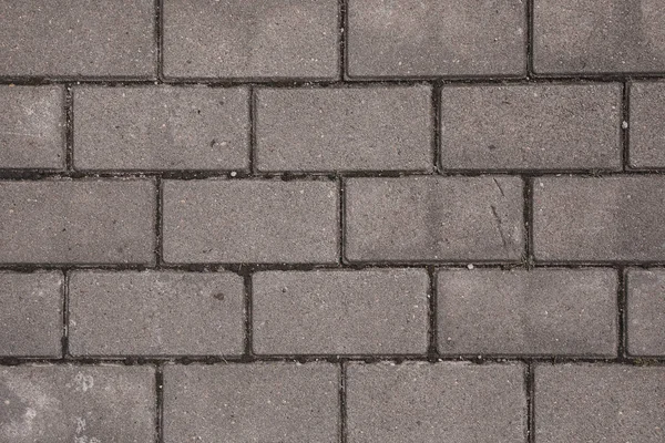 Granite cobble stone pavement background texture. — Stock Photo, Image