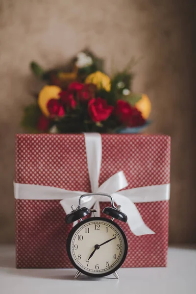 clock on christmas background, Happy New Year: morning clock and gift box