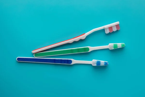 Toothbrushes Blue Background Object Shaped Pieces — Stock Photo, Image