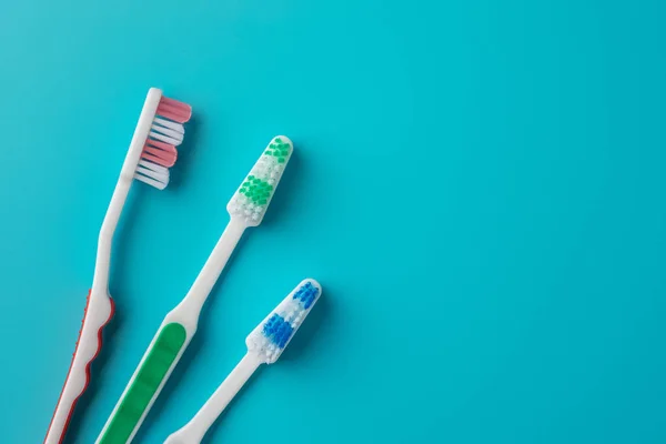 Family Toothbrushes Blue Background Copyspace Space Text — Stock Photo, Image