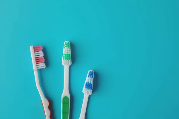 Family Toothbrushes Blue Background Space Text — Stock Photo, Image