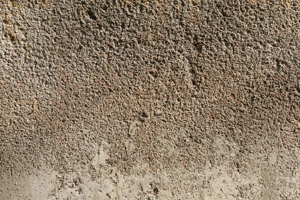 Sfondo della texture di un muro di cemento leggero . — Foto Stock