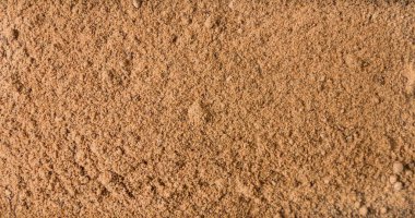 Küçük Hindistan cevizi arka plan çentikli veya kara. Doğal baharat doku. Doğal baharat ve Gıda katkı maddeleri.