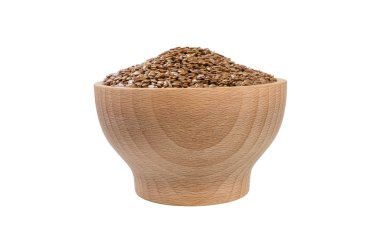 Beyaz arka planda izole ahşap kase keten tohumu. Beslenme. Gıda madde. ön görünüm.