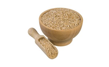 ahşap kase ve kepçe beyaz arka plan üzerinde izole ezilmiş. Beslenme. Biyo. doğal gıda maddesi.