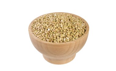 beyaz arka plan üzerinde izole ahşap kase ham karabuğday. Beslenme. gıda maddesi.