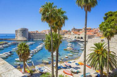 Split, Croatia, May 21 2018, Beautiful sunny day in the old town, Nice outdoors of the popular tourist city. Harbor with boats and blue sky. clipart