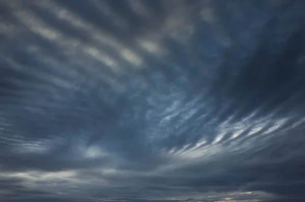 Strange cloud pattern and over a lake in Katrineholm Sweden.