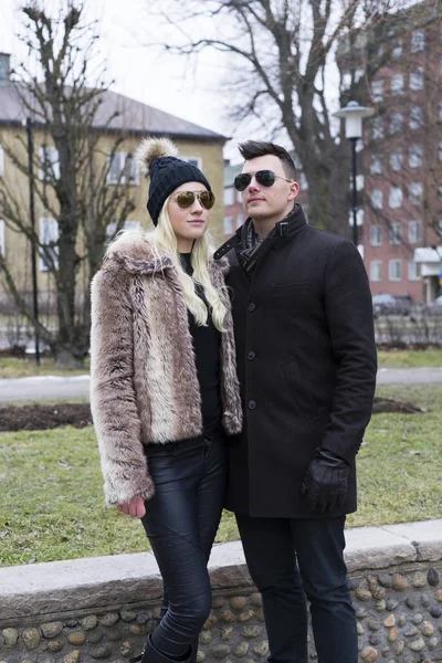 Young Couple Standing Outdoors Wearing Sunglasses Winter Daytime Soft Light — Stock Photo, Image