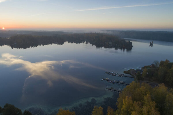 aerial view of landscape with lakes and islands at twilight 