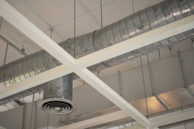 Air duct conditioning ceiling in the building clipart