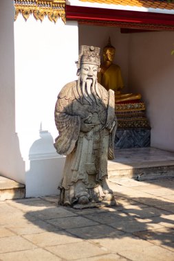 Tayland 'daki Wat Pho Tapınağı' nın taş heykelini kapatın.
