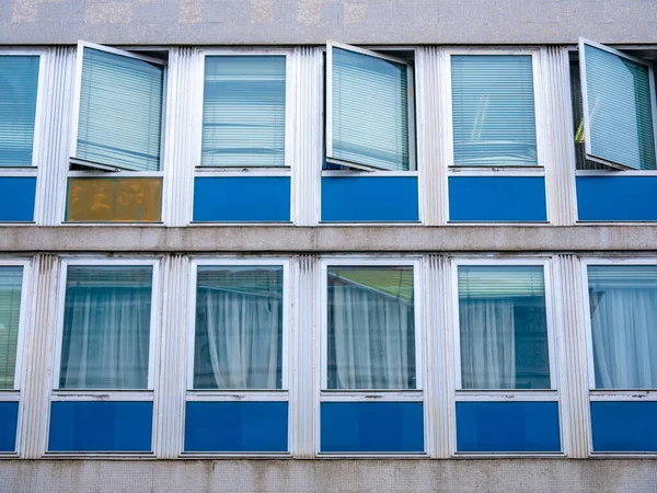 View on the windows of old flat buildings in Gyor, Hungary