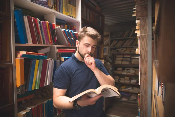 Student Stands Cozy Public Library Reads Book Man Beard Looking — Stock Photo, Image