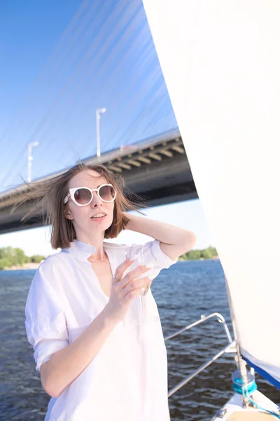 Attractive Woman Braces Her Teeth Standing Yacht Glass Wine Background — Stock Photo, Image