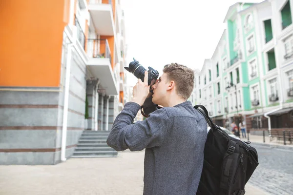 Young Man Walks Streets Old Beautiful Town Camera His Hands — Stock Photo, Image