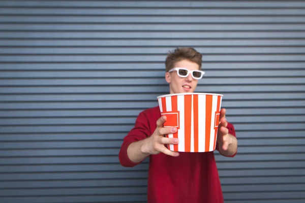 Young Man Glasses Red Sweatshirt Large Cup Popcorn Stands Background — Stock Photo, Image