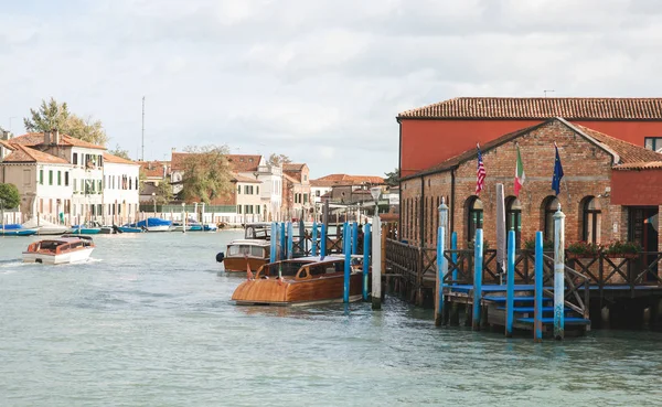 Village at sea, boats, landscape of Murano, Venice. Architecture, sea, boats on the island of Murano, Venice