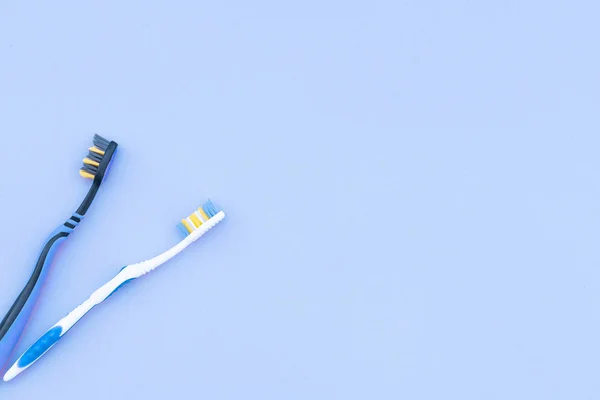 Two Toothbrushes Isolated Blue Background Copyspace Flat Lay Dental Care — Stock Photo, Image