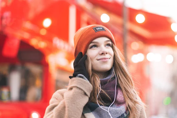 Smiling Young Woman Warm Clothes Smartphone Her Hands Listens Music — Stock Photo, Image
