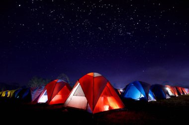tent at night on phu kra dung nation park of thailand clipart