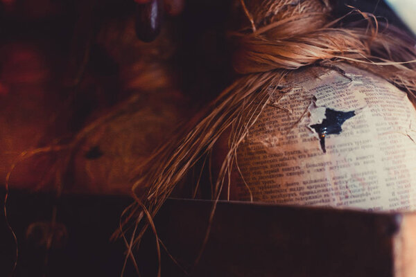 Decor of big glass jars wrapped in old retro newspaper