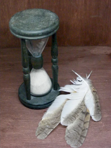 Christmas Magic Wild Owl Feathers Hourglass Dark Wooden Background — Stock Photo, Image