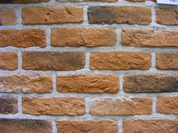 Brick wall, construction, brown in red and brown vintage bricks