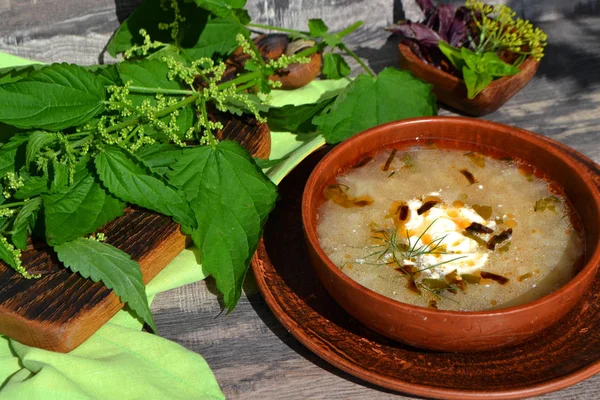 Bright soup of nettles on the wooden dark table — Stock Image Bright Soup Nettles Wooden Dark Table Stock Picture
