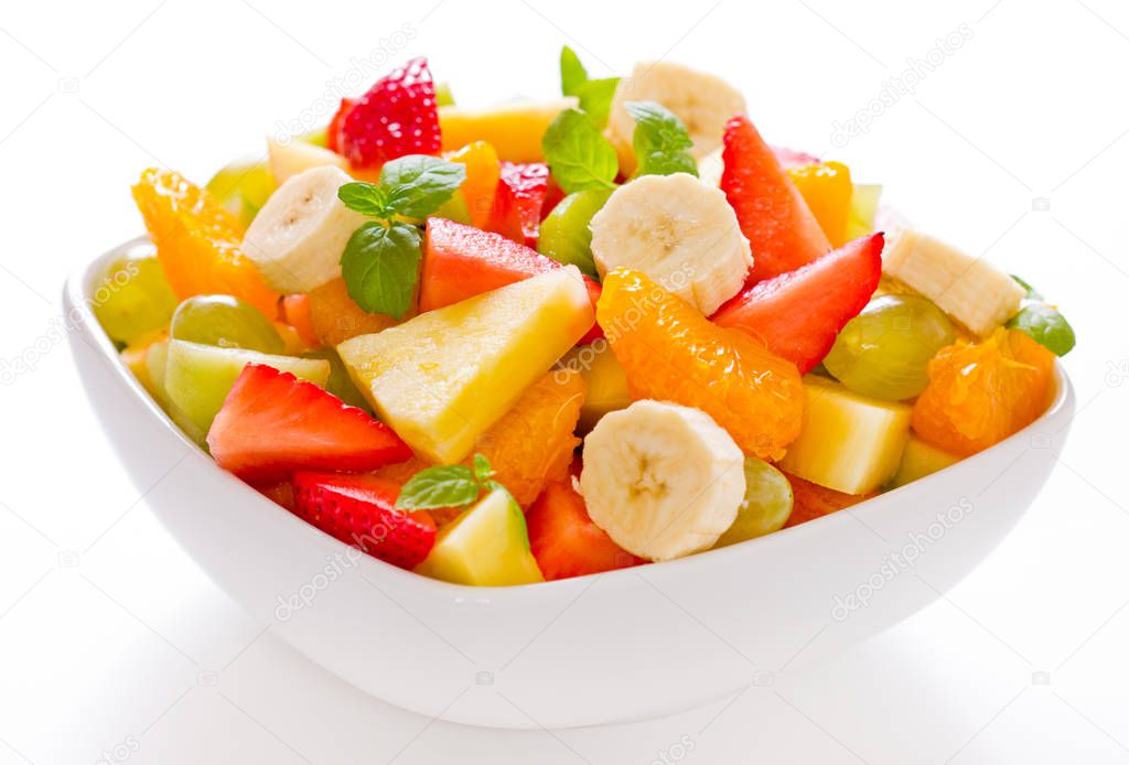 close up view of fresh fruits salad in bowl
